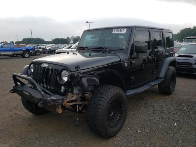 Photo 1 VIN: 1C4BJWDG3EL159424 - JEEP WRANGLER U 