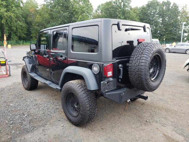 Photo 2 VIN: 1C4BJWDG3EL159424 - JEEP WRANGLER U 