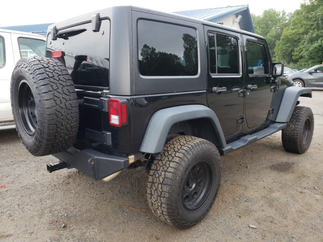 Photo 3 VIN: 1C4BJWDG3EL159424 - JEEP WRANGLER U 