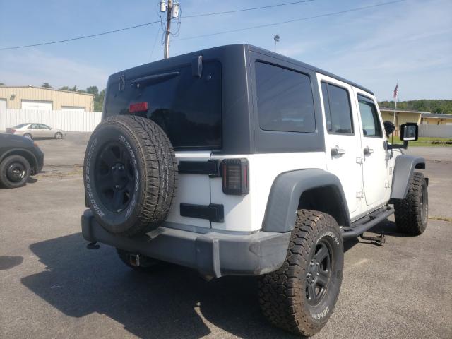 Photo 3 VIN: 1C4BJWDG3GL311141 - JEEP WRANGLER U 