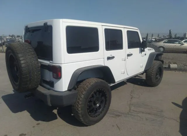 Photo 3 VIN: 1C4BJWDG4EL293889 - JEEP WRANGLER UNLIMITED 