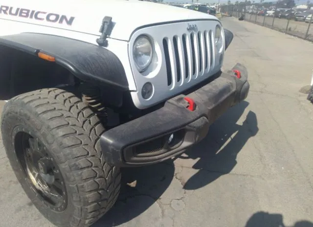 Photo 5 VIN: 1C4BJWDG4EL293889 - JEEP WRANGLER UNLIMITED 