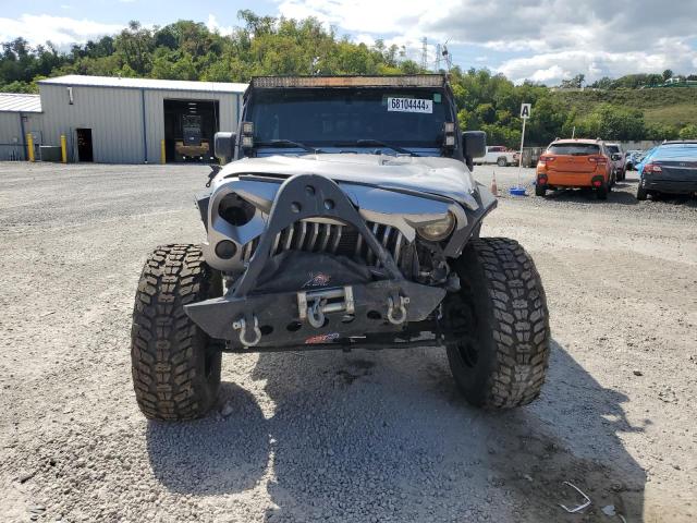 Photo 4 VIN: 1C4BJWDG4EL305975 - JEEP WRANGLER U 