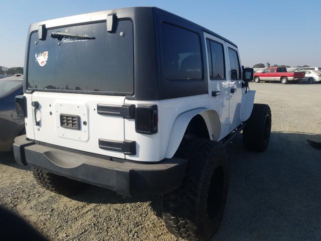 Photo 3 VIN: 1C4BJWDG4GL316882 - JEEP WRANGLER U 