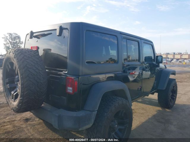 Photo 3 VIN: 1C4BJWDG5GL270706 - JEEP WRANGLER 