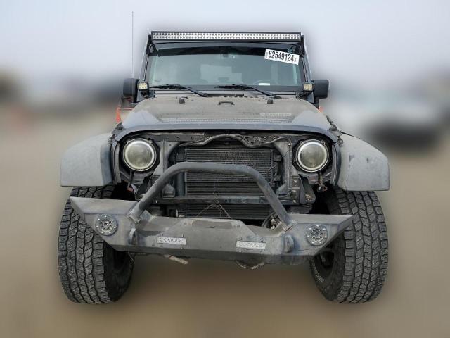 Photo 4 VIN: 1C4BJWDG7GL310266 - JEEP WRANGLER 