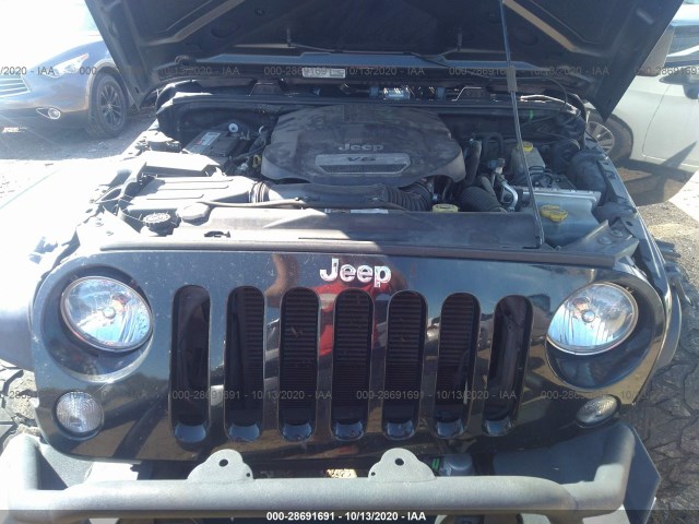 Photo 9 VIN: 1C4BJWDG8EL257798 - JEEP WRANGLER UNLIMITED 