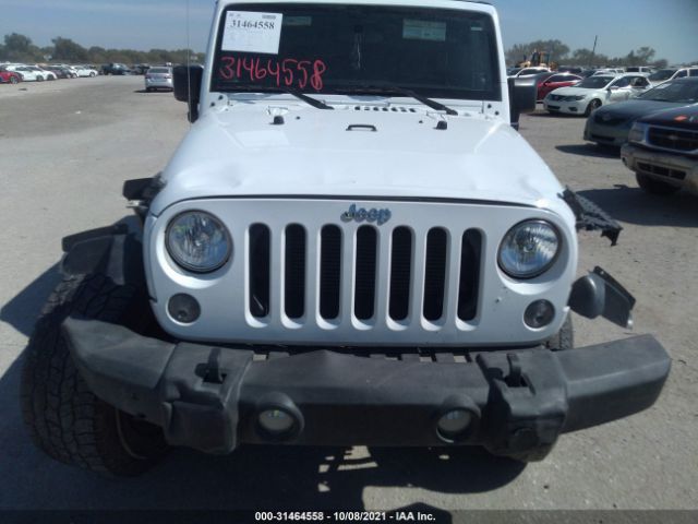 Photo 5 VIN: 1C4BJWDG8EL322469 - JEEP WRANGLER UNLIMITED 