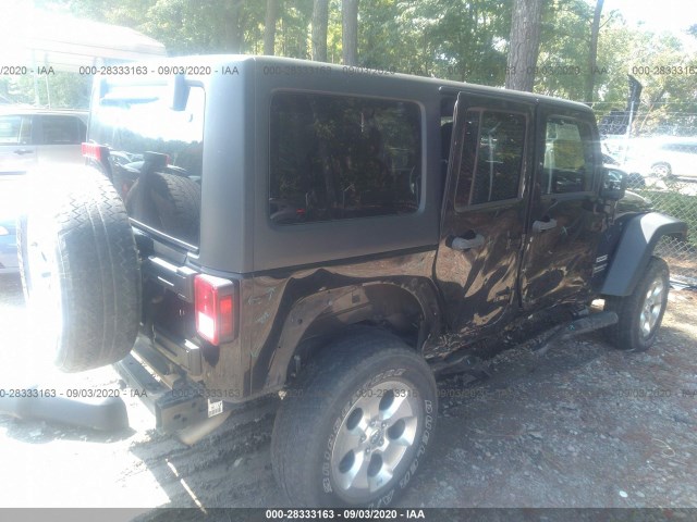 Photo 3 VIN: 1C4BJWDG9EL249743 - JEEP WRANGLER UNLIMITED 