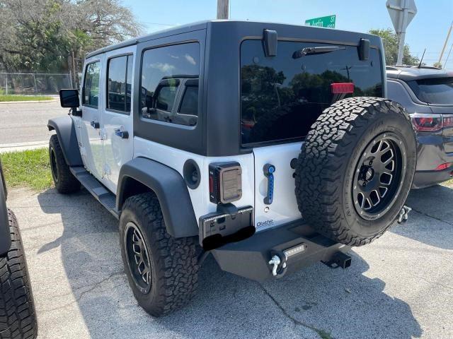 Photo 2 VIN: 1C4BJWDGXGL213370 - JEEP WRANGLER 