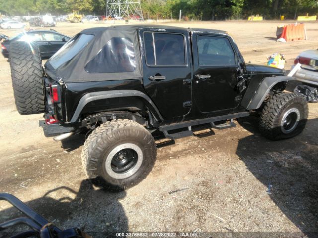 Photo 3 VIN: 1C4BJWEG0EL324599 - JEEP WRANGLER UNLIMITED 