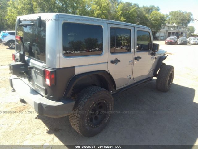 Photo 3 VIN: 1C4BJWEG1EL105912 - JEEP WRANGLER UNLIMITED 