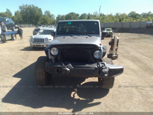 Photo 5 VIN: 1C4BJWEG1EL105912 - JEEP WRANGLER UNLIMITED 