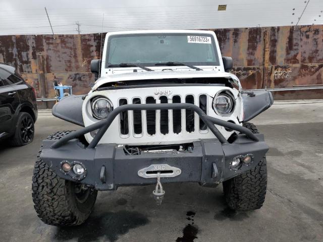 Photo 4 VIN: 1C4BJWEG1GL166664 - JEEP WRANGLER U 