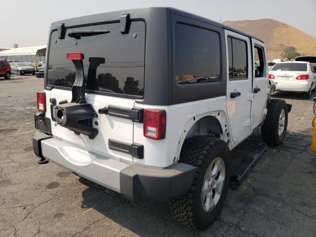 Photo 3 VIN: 1C4BJWEG2EL174480 - JEEP WRANGLER U 