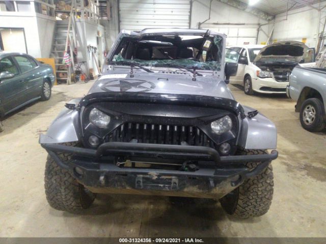 Photo 5 VIN: 1C4BJWEG4EL128780 - JEEP WRANGLER UNLIMITED 