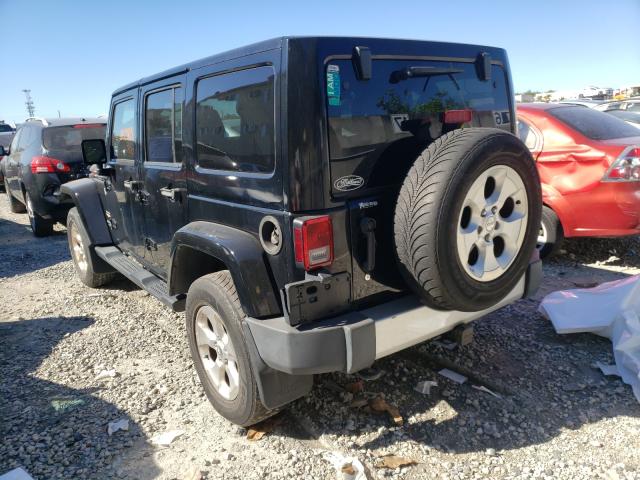 Photo 2 VIN: 1C4BJWEG5DL695076 - JEEP WRANGLER U 