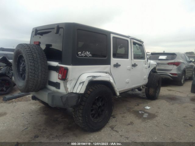 Photo 3 VIN: 1C4BJWEG6EL261864 - JEEP WRANGLER UNLIMITED 