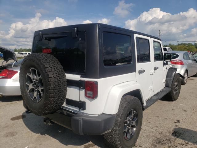 Photo 3 VIN: 1C4BJWEG8EL282120 - JEEP WRANGLER U 