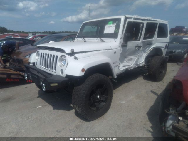 Photo 1 VIN: 1C4BJWEG9GL114859 - JEEP WRANGLER UNLIMITED 