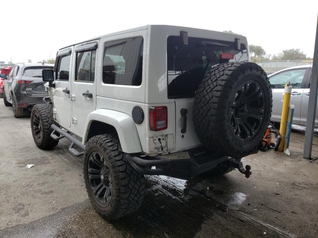 Photo 2 VIN: 1C4BJWEGXEL304070 - JEEP WRANGLER U 