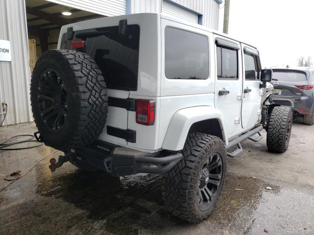 Photo 3 VIN: 1C4BJWEGXEL304070 - JEEP WRANGLER U 