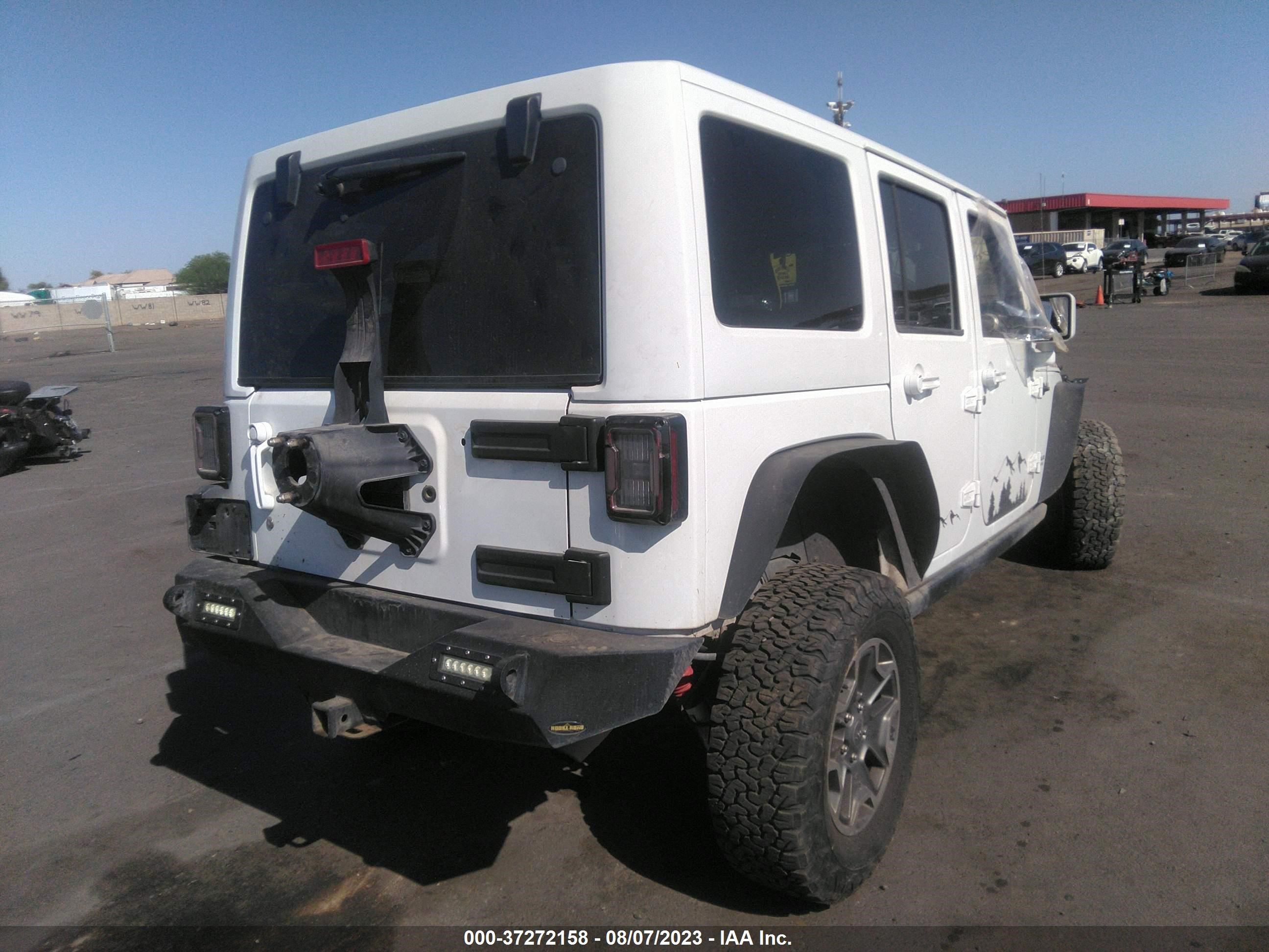 Photo 3 VIN: 1C4BJWFG0EL182902 - JEEP WRANGLER 