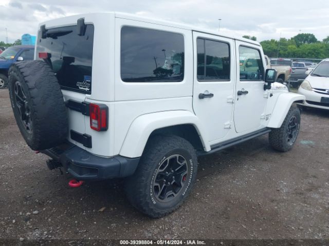 Photo 3 VIN: 1C4BJWFG0EL262913 - JEEP WRANGLER UNLIMITED 