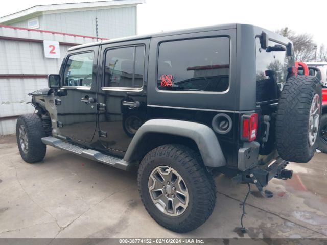 Photo 2 VIN: 1C4BJWFG2EL187874 - JEEP WRANGLER UNLIMITED 