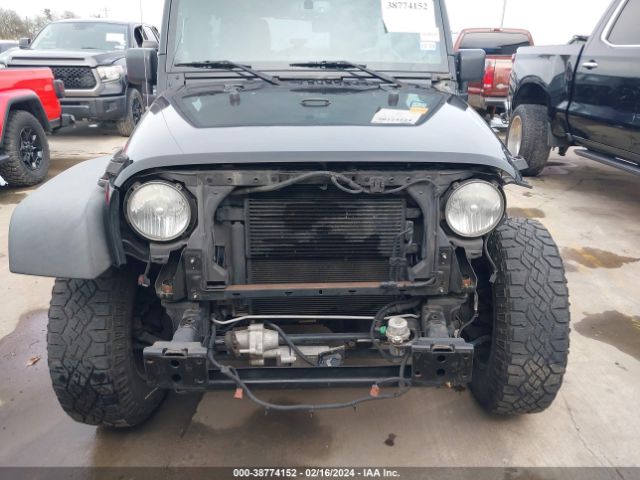 Photo 5 VIN: 1C4BJWFG2EL187874 - JEEP WRANGLER UNLIMITED 