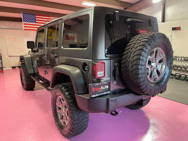 Photo 2 VIN: 1C4BJWFG2EL205791 - JEEP WRANGLER U 