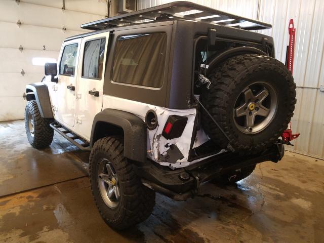 Photo 2 VIN: 1C4BJWFG2EL243604 - JEEP WRANGLER U 