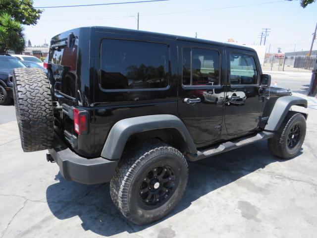 Photo 2 VIN: 1C4BJWFG3DL534952 - JEEP WRANGLER U 