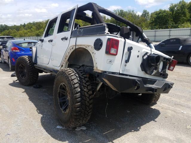 Photo 2 VIN: 1C4BJWFG3DL569667 - JEEP WRANGLER U 