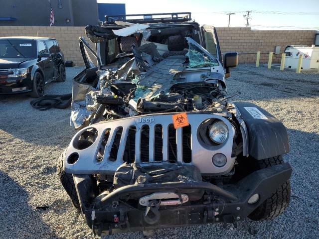 Photo 4 VIN: 1C4BJWFG3EL166578 - JEEP WRANGLER U 