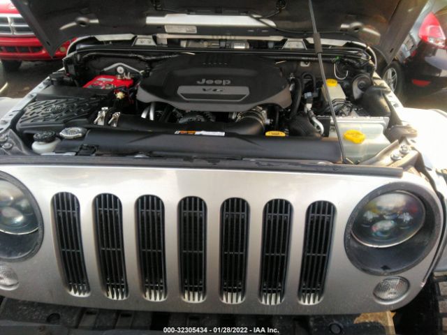 Photo 9 VIN: 1C4BJWFG3EL167424 - JEEP WRANGLER UNLIMITED 