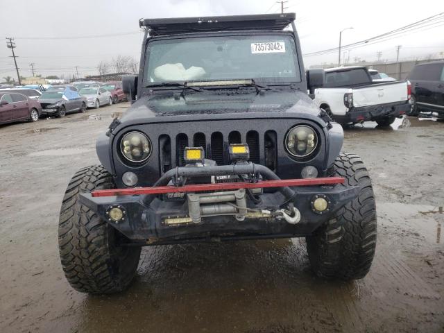 Photo 4 VIN: 1C4BJWFG3EL197801 - JEEP WRANGLER U 