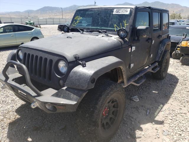 Photo 1 VIN: 1C4BJWFG4EL100489 - JEEP WRANGLER U 