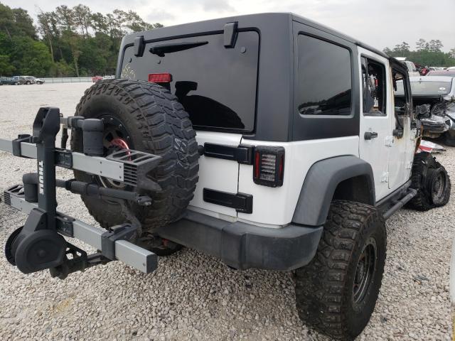 Photo 3 VIN: 1C4BJWFG4GL158704 - JEEP WRANGLER U 