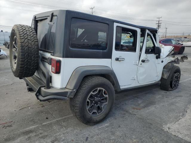 Photo 2 VIN: 1C4BJWFG5EL296717 - JEEP WRANGLER U 