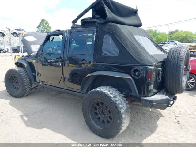 Photo 2 VIN: 1C4BJWFG7EL165787 - JEEP WRANGLER UNLIMITED 