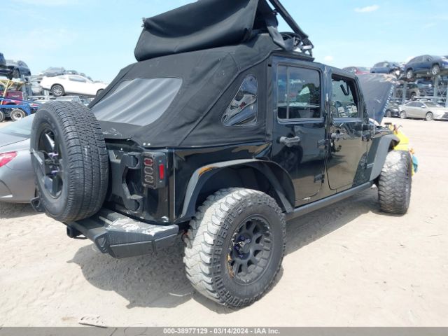 Photo 3 VIN: 1C4BJWFG7EL165787 - JEEP WRANGLER UNLIMITED 