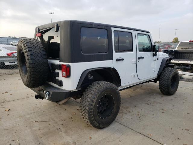 Photo 3 VIN: 1C4BJWFG7EL220738 - JEEP WRANGLER U 