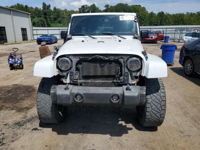 Photo 4 VIN: 1C4BJWFG7EL310715 - JEEP WRANGLER U 