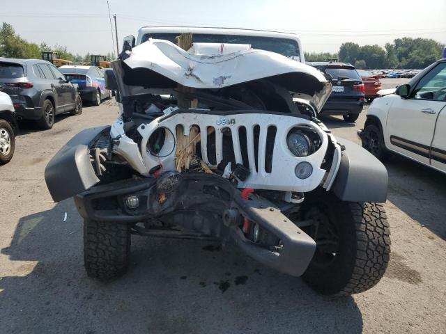 Photo 4 VIN: 1C4BJWFG7HL557799 - JEEP WRANGLER U 