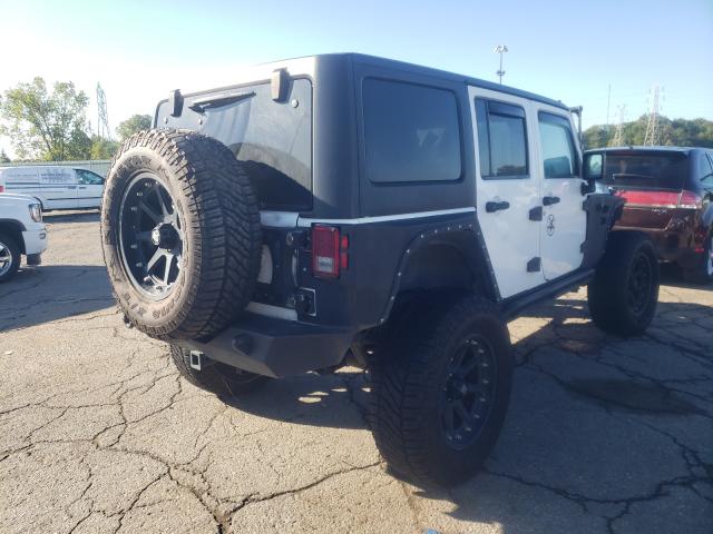 Photo 3 VIN: 1C4BJWFG8CL168677 - JEEP WRANGLER U 