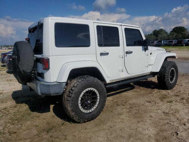 Photo 2 VIN: 1C4BJWFG8GL283768 - JEEP WRANGLER U 