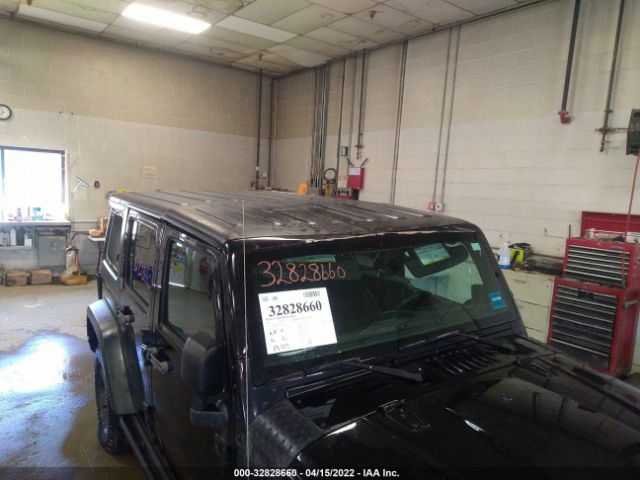 Photo 5 VIN: 1C4BJWFG9CL180742 - JEEP WRANGLER UNLIMITED 