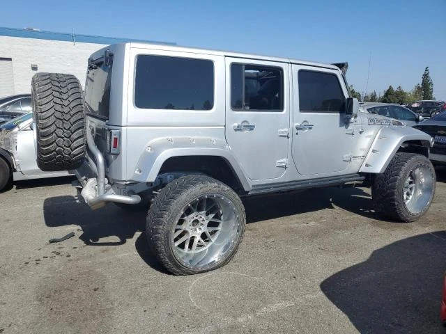 Photo 2 VIN: 1C4BJWFG9CL199520 - JEEP WRANGLER U 