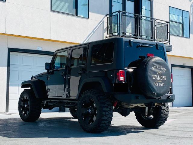 Photo 2 VIN: 1C4BJWFG9DL515029 - JEEP WRANGLER U 